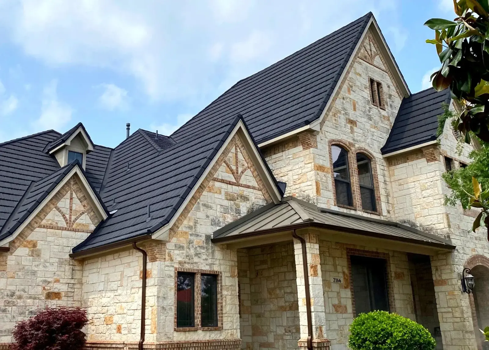 Stone-coated steel roof panels on a residential roof